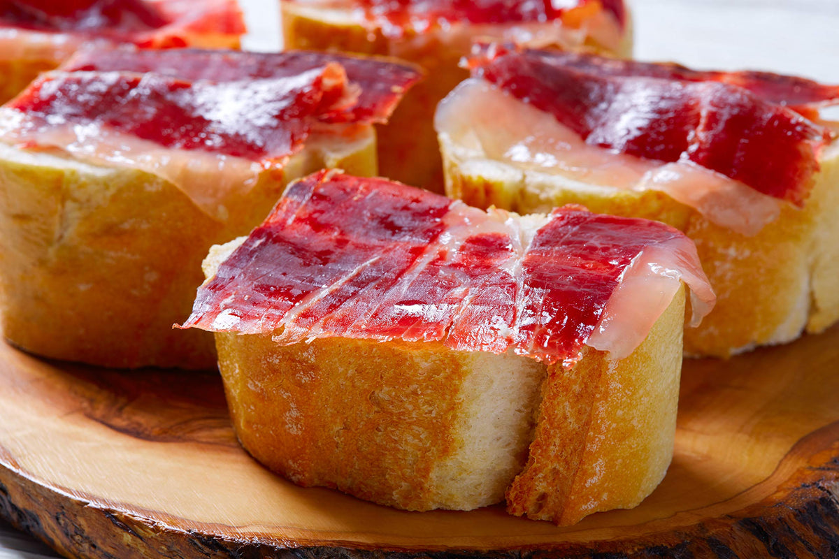 Iberico Ham de Bellota Shoulder (Paleta) Cured for 24 Months, Between 20-25 Servings, 10-12 lbs from Fermin Plus Ham Holder and Iberico Ham Knife